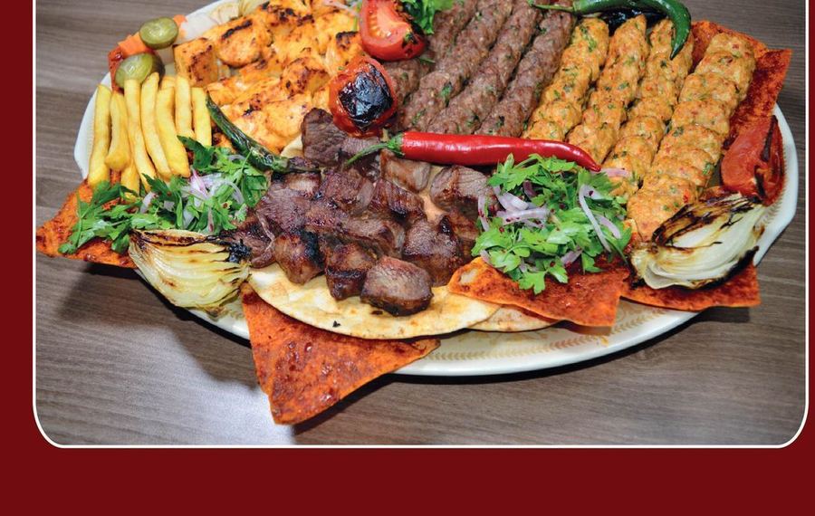 Mixed grill platter with seekh kebab, tikka boti and grilled vegetables