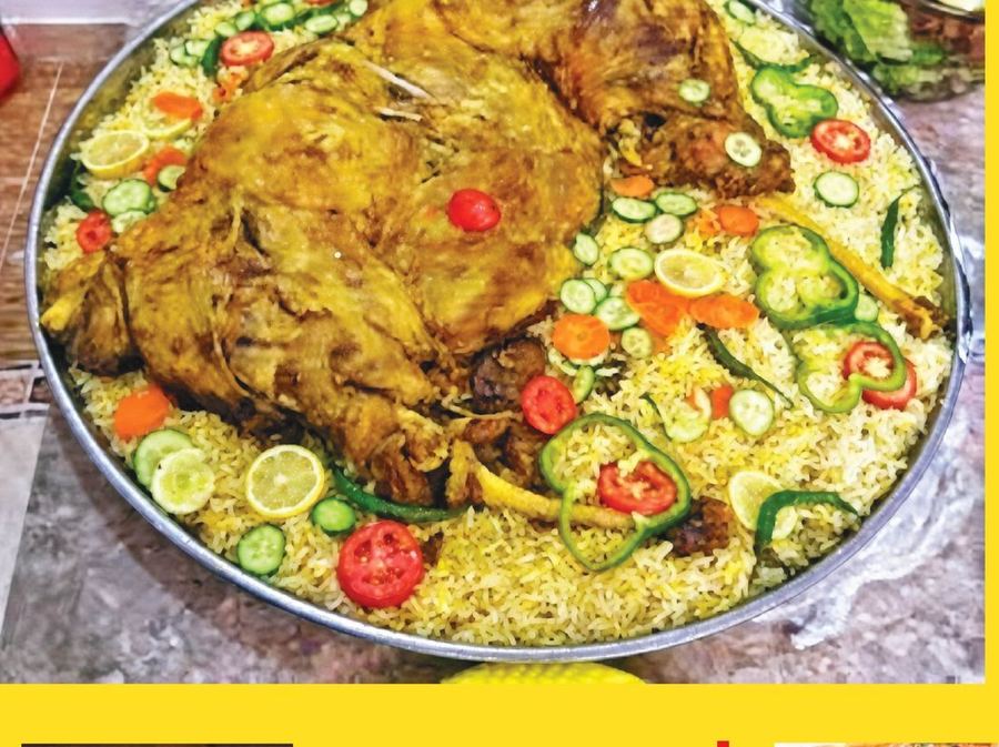 Whole mutton dum pukht served on a bed of yellow rice